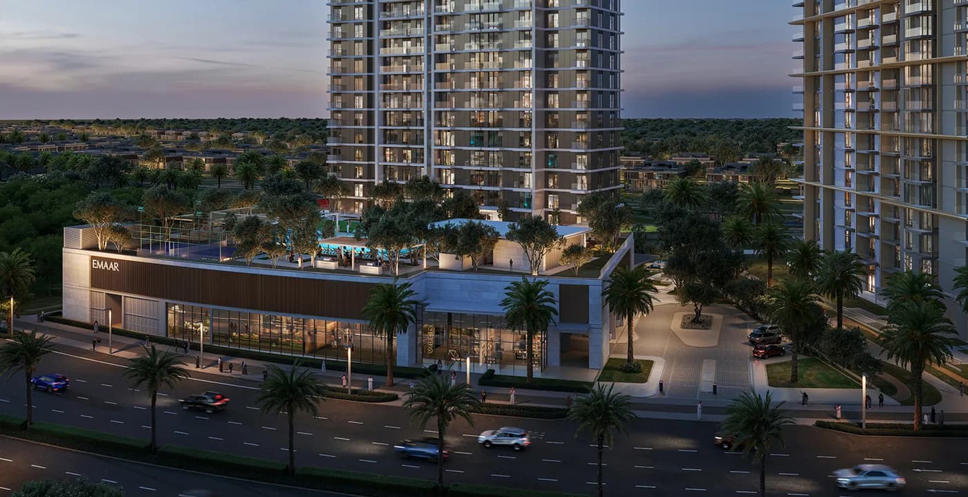 Golf Hillside towers at dusk above a landscaped retail podium